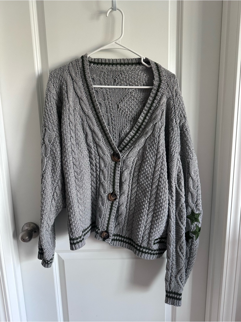 Taylor Swift Gray Cable-Knit Cardigan with Green Star Detail